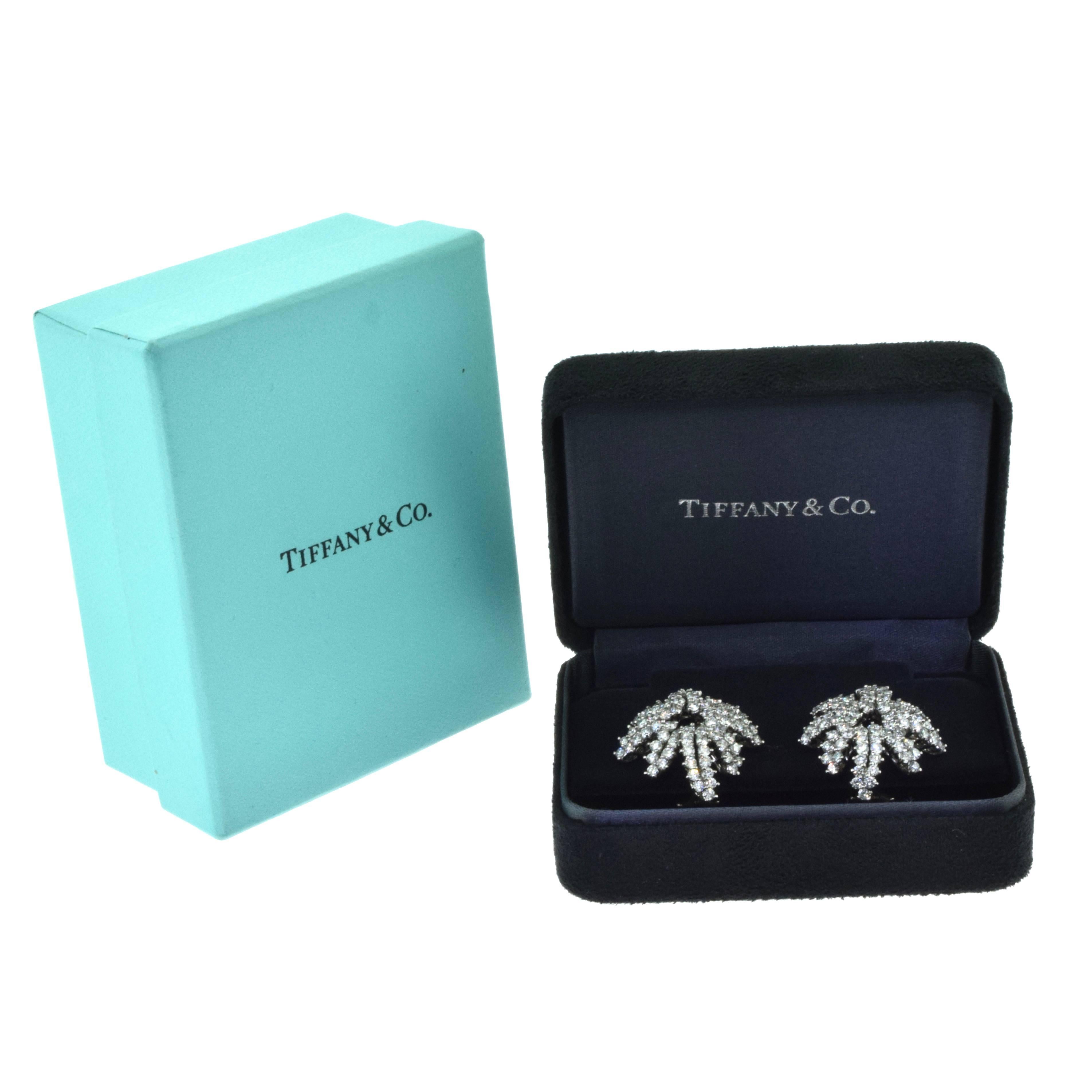 Designer: Tiffany & Co.​​​​​​​
Collection: Fireworks
Metal: Platinum, 18k White Gold 
Stones: 168 Round Brilliant Cut Diamonds
Diamond Color: F - G
Diamond Clarity: VVS - VS
Total Carat Weight: 6.8 ct 
Total Item Weight (g):  17.2
Dimensions:
