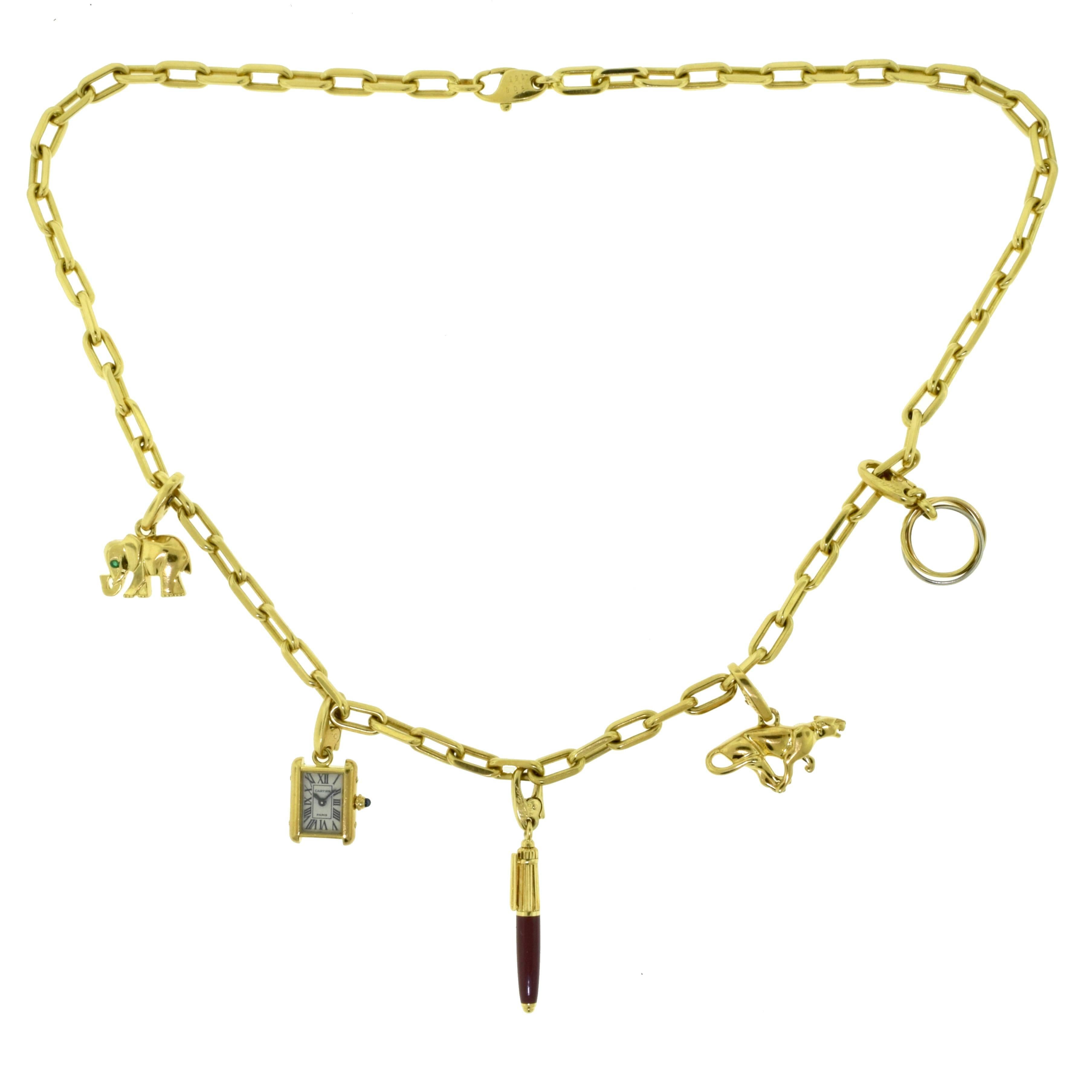 Estate Cartier Yellow Gold Charm Necklace with Cartier Santos Chain For Sale