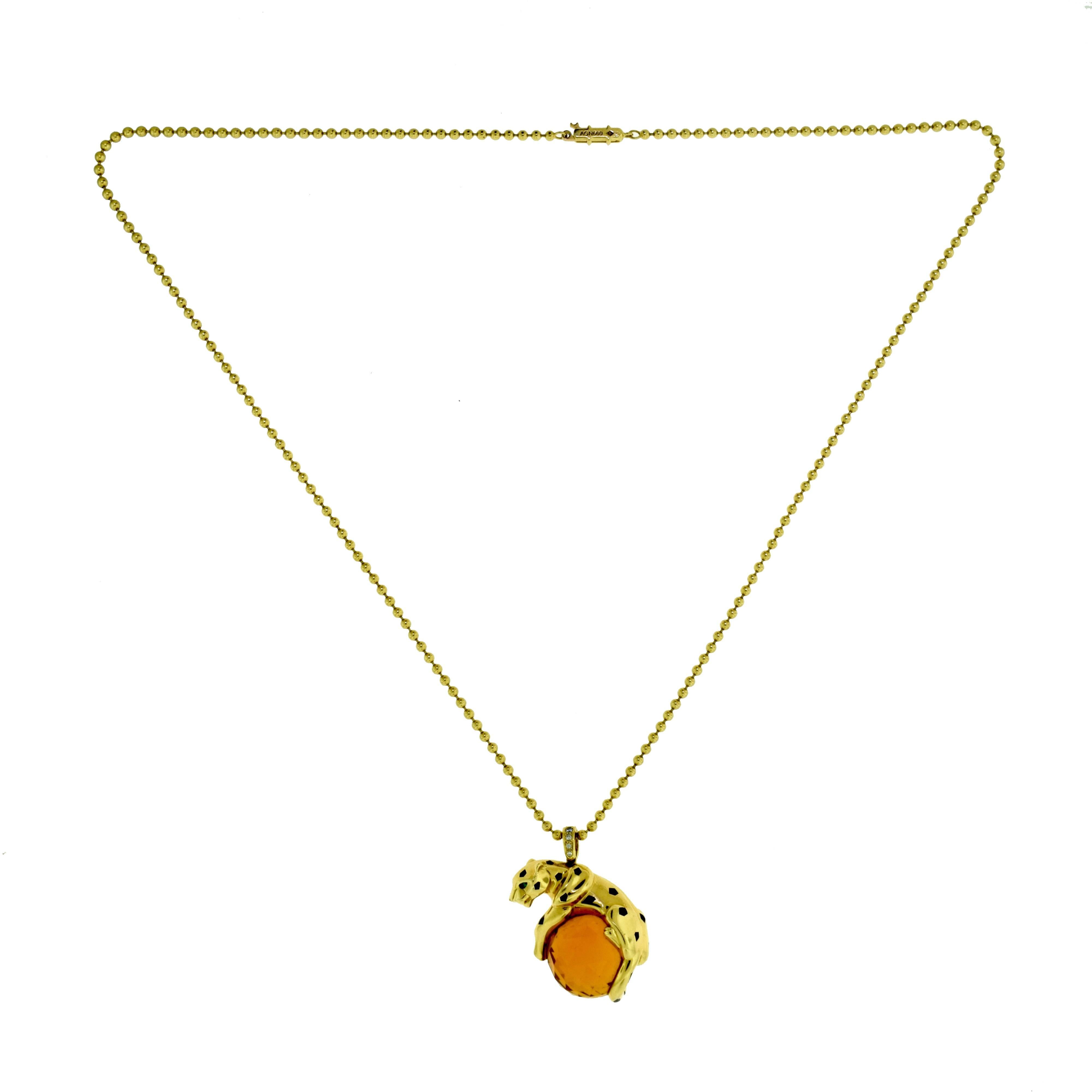 Designer: Cartier
Collection: Panthère de Cartier
Metal: 18 Karat Yellow Gold
Non-Metal Material: Black Lacquer
Stones: 1 Round Citrine Bead, 4 Brilliant Cut Diamonds, Tsavorite Garnets
Citrine Bead Diameter: 17.52 mm
Total Necklace Length: