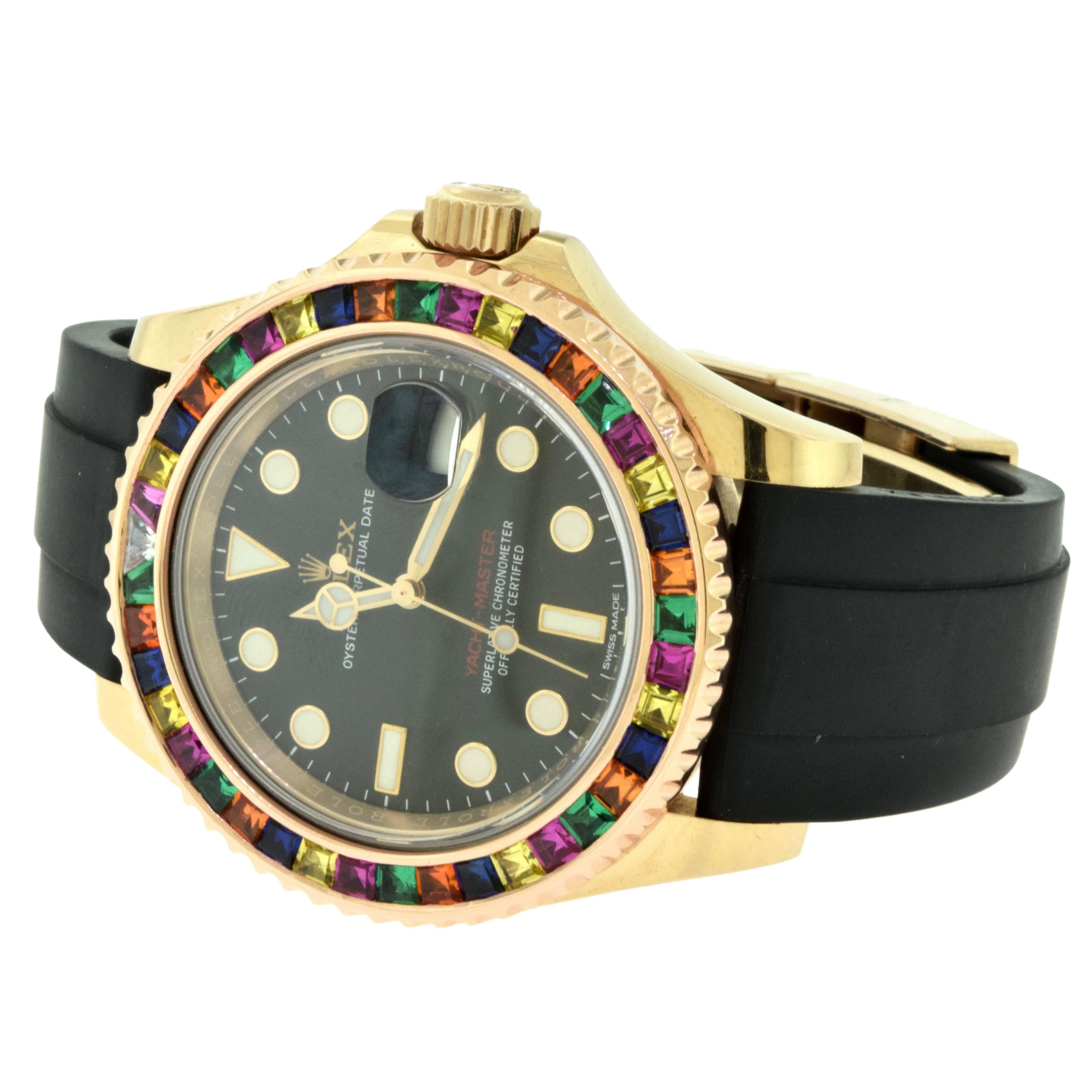 Brand: Rolex
Reference: 11665
Caliber: 3135
Movement: Perpetual, Mechanical, Self-Winding
Case Size: 40 mm
Stones: Multi Colored Sapphires (aftermarket)
Bracelet: Oysterflex
Model Case: Oyster, Everose Gold
Oyster Architecture: Monobloc case,