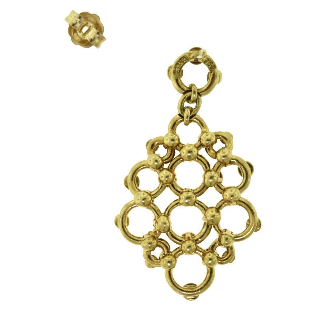 Delicately patterned to resemble falling honeycombs, this Tiffany & Co. pair of earrings is fashioned in solid 18k yellow gold. You will love these earrings - especially because they are so original!

Item Specifications:
Designer: Tiffany &