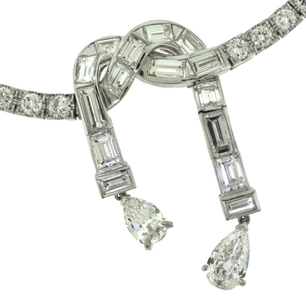 A dazzling necklace to be worn in the most beautiful settings. You will fall in love with 20 carats of glistening diamonds on a platinum cocktail necklace.

Metal: Platinum
Metal Purity: 950
Stones: Pear Shaped Diamonds, Baguette Diamonds, Round