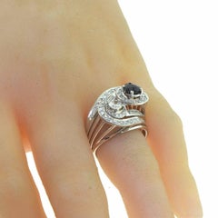 Diamond and Sapphire Center Stone Diamond White Gold Swirl Ring