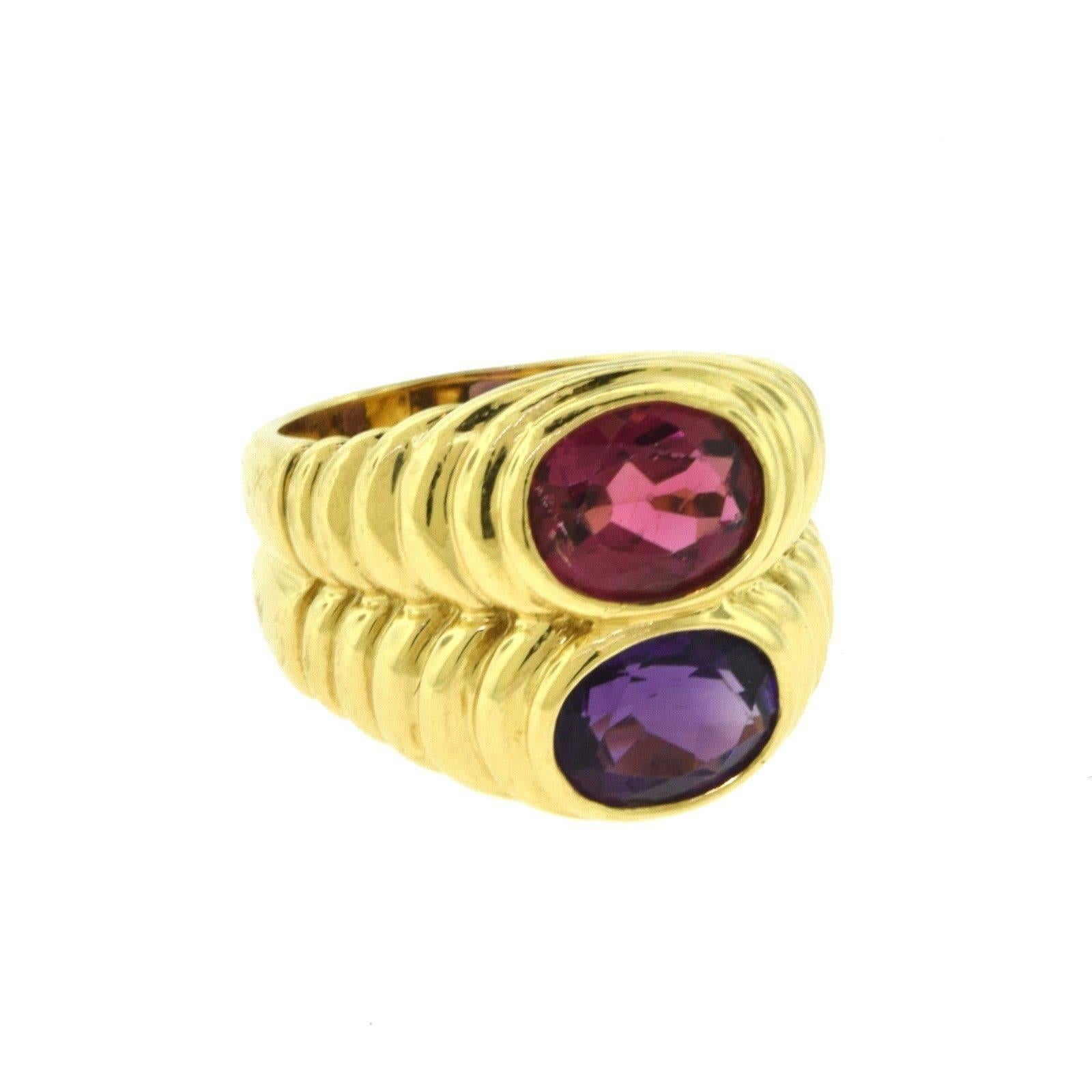 Gorgeous multi gemstone ring designed and created by BVLGARI, with an oval rubellite and an amethyst stone in 18k yellow gold. A vintage and beautiful look to go with your casual or elegant attire. Contact us for more information.

Item