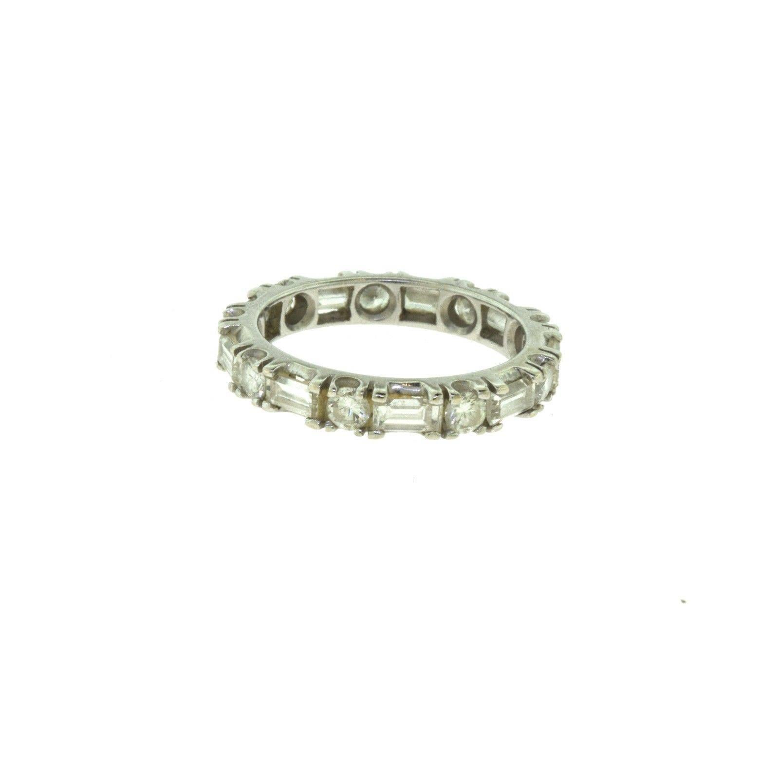 A gorgeous eternity band showcasing both round and baguette cut diamonds. Usually eternity bands are only one shape of diamond. Ideal as a skinny wedding band, Stackable Band, or even as a stand alone piece! 

Item Specifications:
Style: Diamond