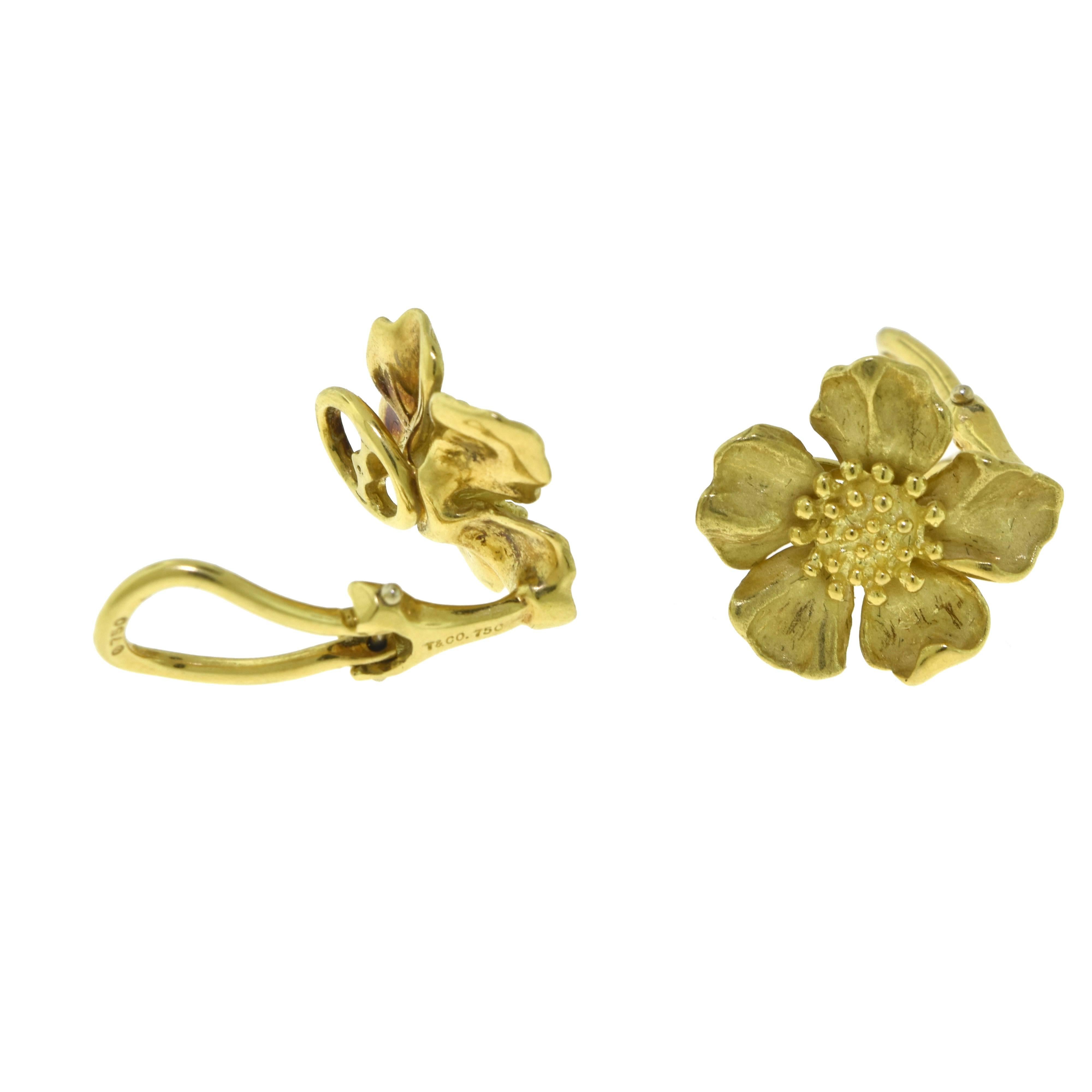 Designer: Tiffany & Co.
Style: Dogwood
Metal: Yellow Gold
Metal Purity: 18k
Total Item Weight (g): 8.7
Flower Dimensions: 15.99 x 14.90 mm
Hallmark: T&Co. 750 
Closure: Clip On 

ABOUT THE ITEM:​​​​​​​​​​​​​​
The Dogwood is not the most popular or