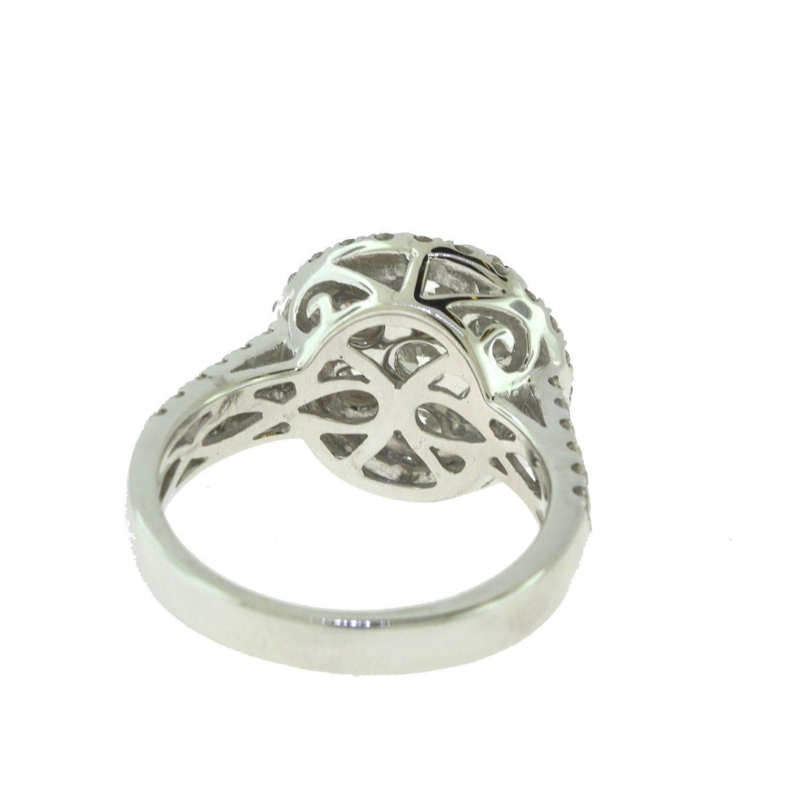 Large Round Halo 2.24 Carat Diamond Engagement Ring in 18 Karat White Gold For Sale 1