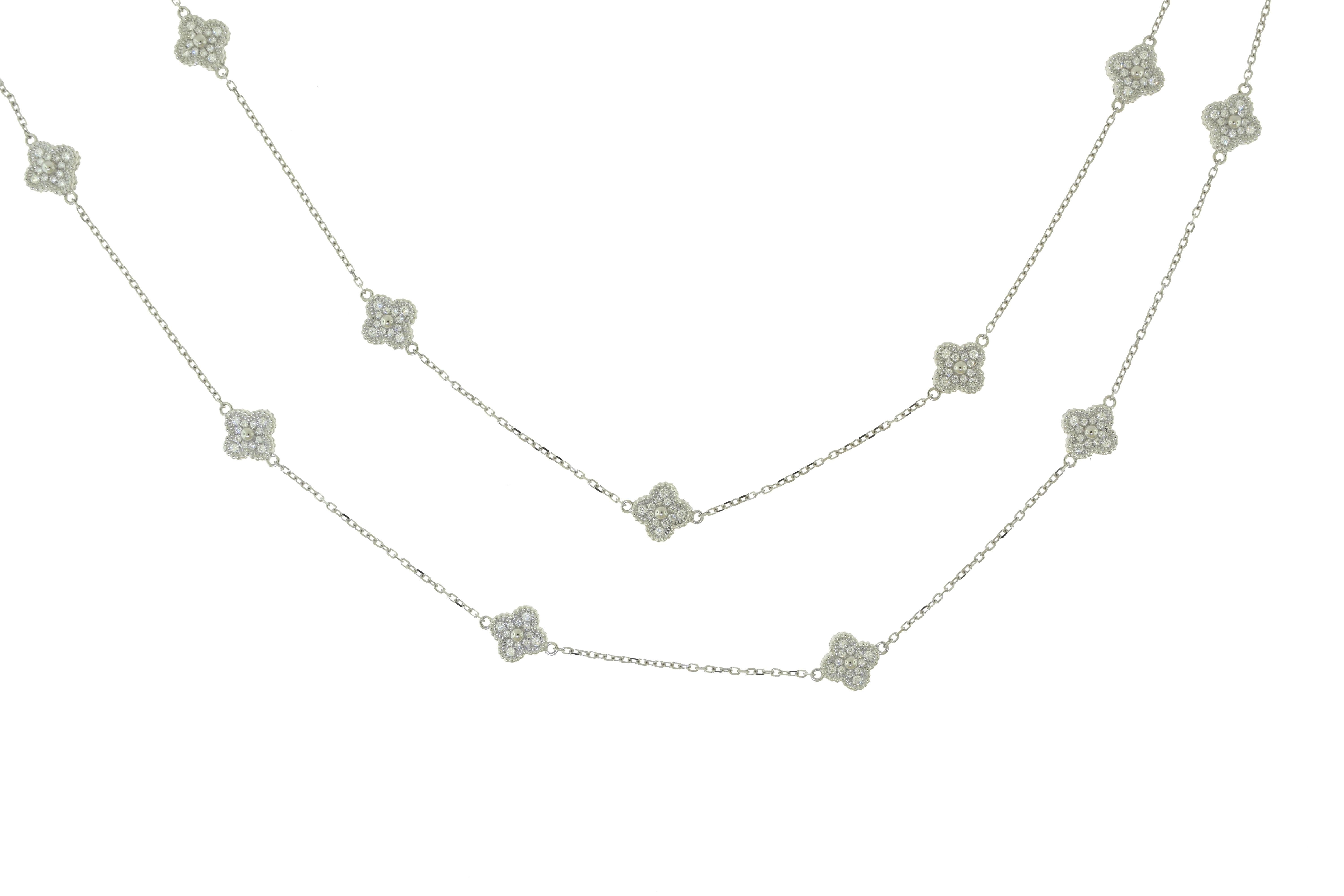 An absolutely magnificent very long necklace with 16 four leaf clover motif's.

Metal: 18 Karat White Gold
Stones: 192 Round Brilliant Cut Diamonds
Diamond Color: F
Diamond Clarity: VS
Total Carat Weight: 2.15 ct
Necklace Length: 32 inches
Total