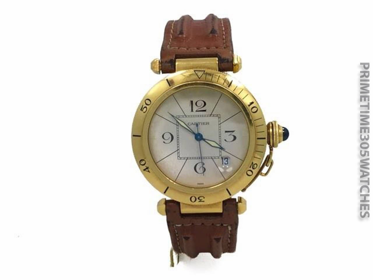 Mens Cartier Pasha in 18k Yellow Gold On Leather Strap. The Watch is in Excellent Condition and Keeping Perfect Time, Movement is Powered by Automatic Mechanical Winding. The Watch is on a bit worn Cartier Strap & Cartier 18k GP Tang Buckle. No Box