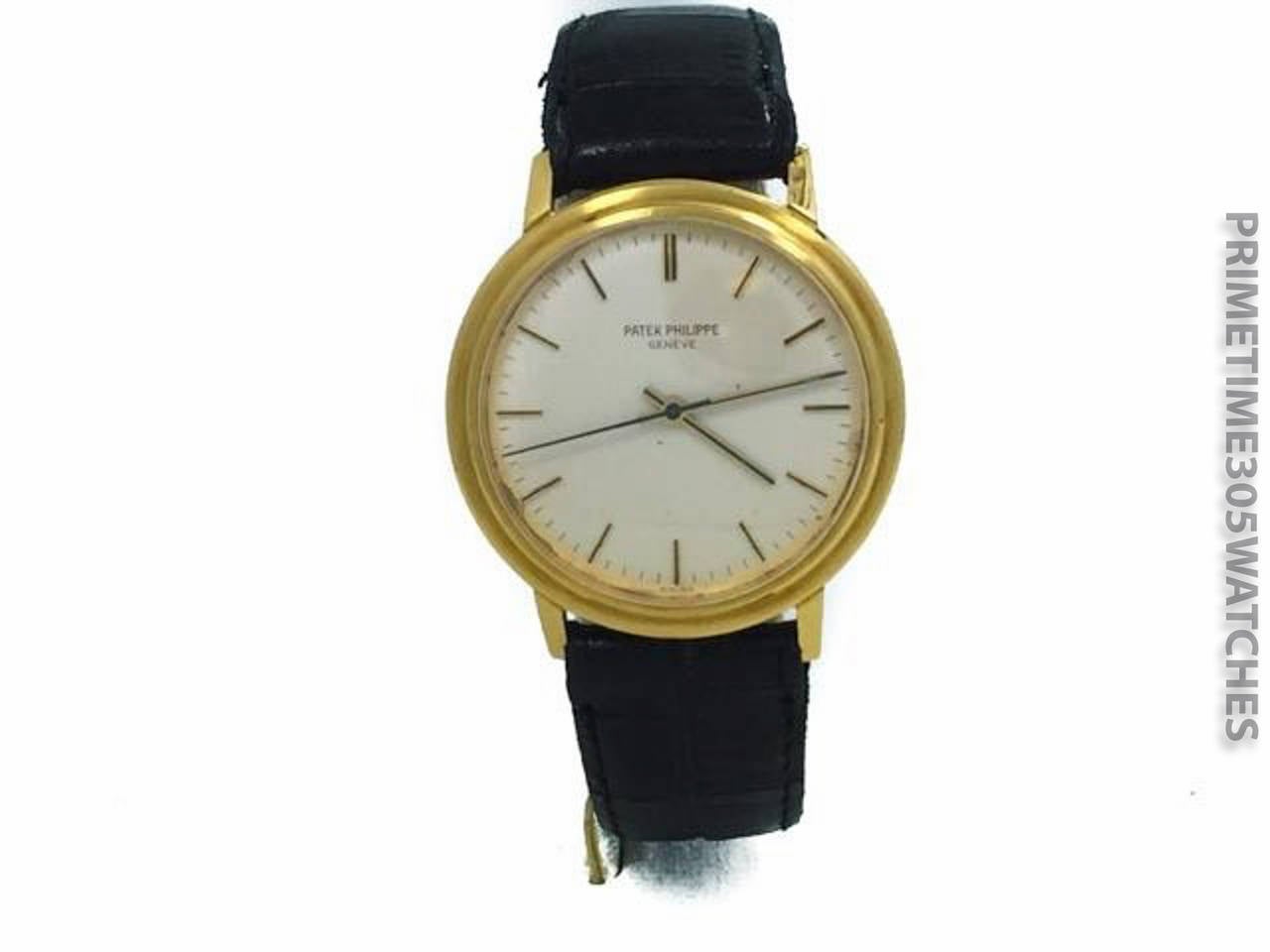 Mens Patek Philippe Calatrava 18k Yellow Gold Automatic Back Wind Watch. The Watch is in Great Condition w/ Few Small Marks on Dial and Keeping Perfect time. The Watch is on a Generic Strap & Buckle.