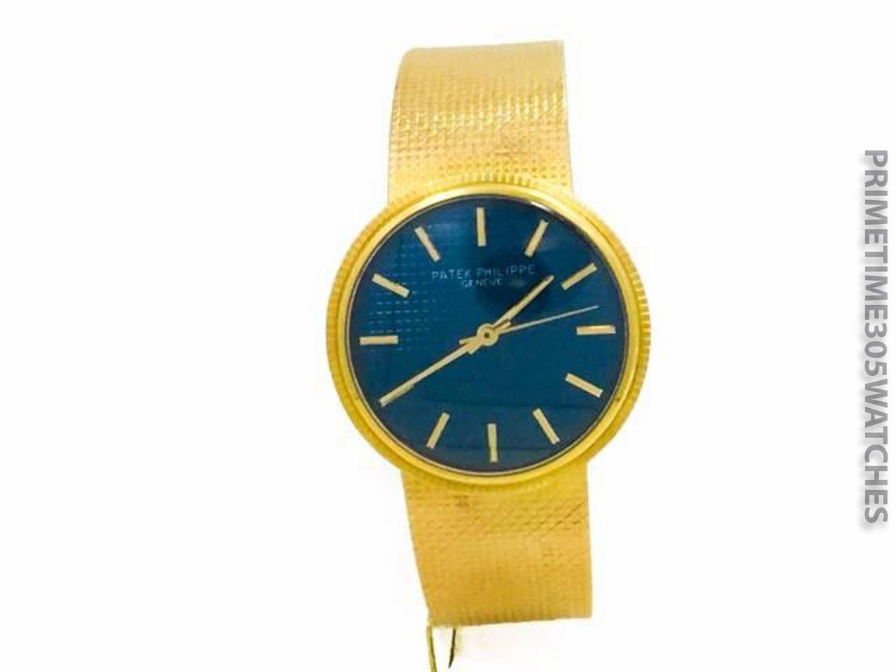Mens (35mm) Patek Philippe 18k Yellow Gold Automatic Movement Watch On Bracelet w/ Backwind Crown, Ref 3563/3. The Watch is Functioning Great and is in Great Condition, though there are Some Small Marks on the Bracelet where watch bracelet connects