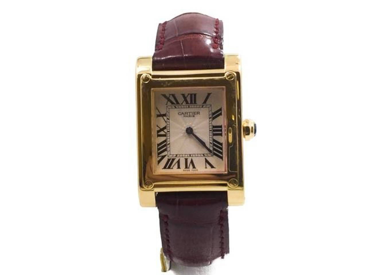New Old Stock Mens Cartier Tank A Vis in 18k Yellow Gold On Strap W/ Deployment Buckle, Ref W1529451. Included with the Watch are its Inner & Outer Box, Manual & Blank Cert. Movement is operated by Manual Wind.