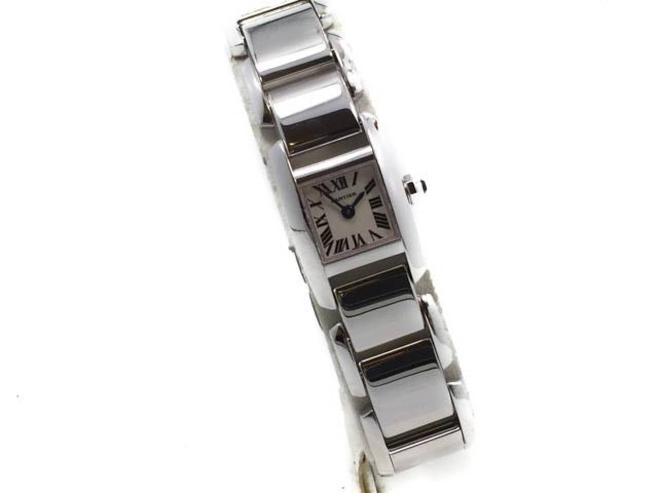 New Old Stock CARTIER Ladies (17mm) TANKISSIME 18KT WHITE GOLD MINI LADIES WATCH, Ref W650029H, Retails $14,500. Included with the Watch are its Inner & Outer Box, Manual & Blank Cert.