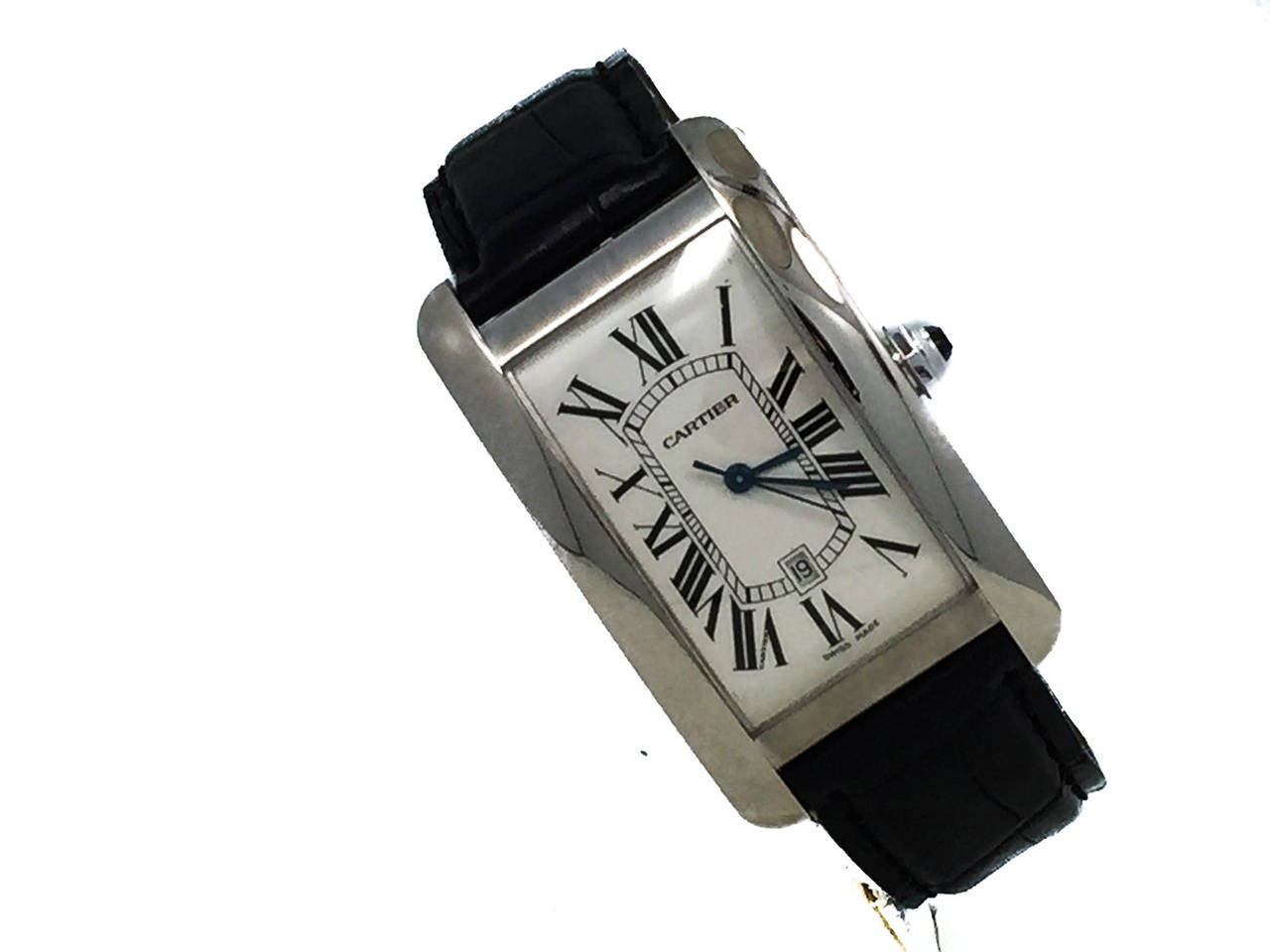 For Sale is a Mens Large Cartier Tank Americaine Automatic Winding Powered Watch in 18k White Gold, Ref W2603256, Retails $16800. The Watch is on a Cartier Strap & Cartier 18k Tang Buckle. No Box Or Papers.