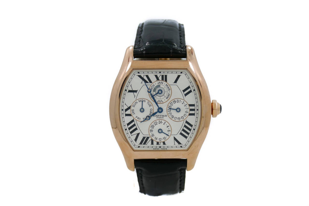 Mens Cartier Tortue Perpetual Calendar XL (35x44mm) in 18k Rose Gold. The Watch is in Excellent Condition & Working Perfectly, Movement is Operated by Automatic Mechanical Winding. The Watch is on a Cartier Strap & Deployment Buckle. The Watch is