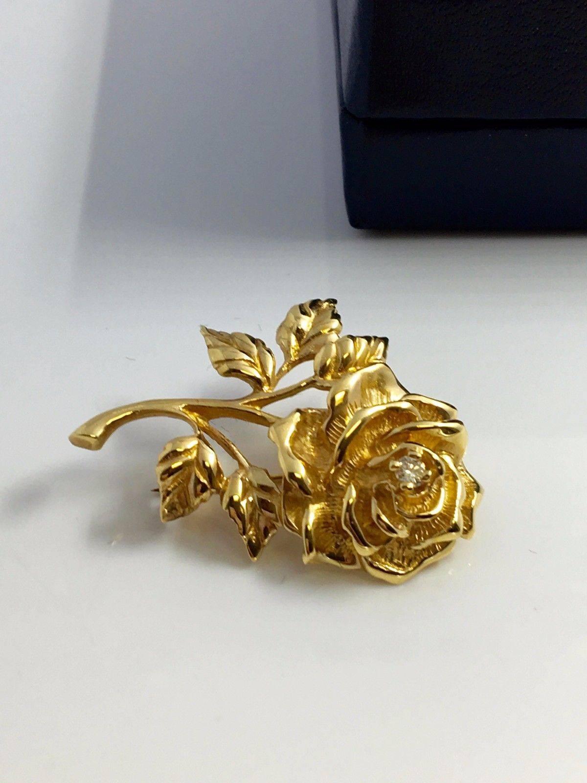 Tiffany & Co. 14k Yellow Gold Round Cut Diamond Rose Flower Brooch Pin With Box

You are bidding on an Authentic! Tiffany & Co Yellow Gold 14k Rose Flower Diamond Earrings that are Vintage and extremely rare to find!

More About the