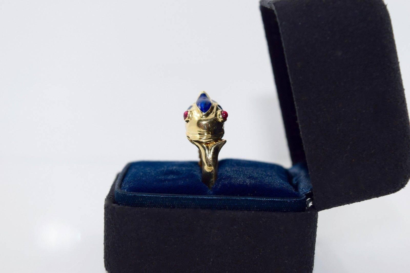 18k Tiffany & Co. Signed Fish Hinge Ring w/ Rubies

Unique and RARE signed piece by the famous Tiffany & Co. Rare to come across vintage jewel, with breathtaking craftsmanship, and in excellent condition with box included. Fish has ruby eyes and
