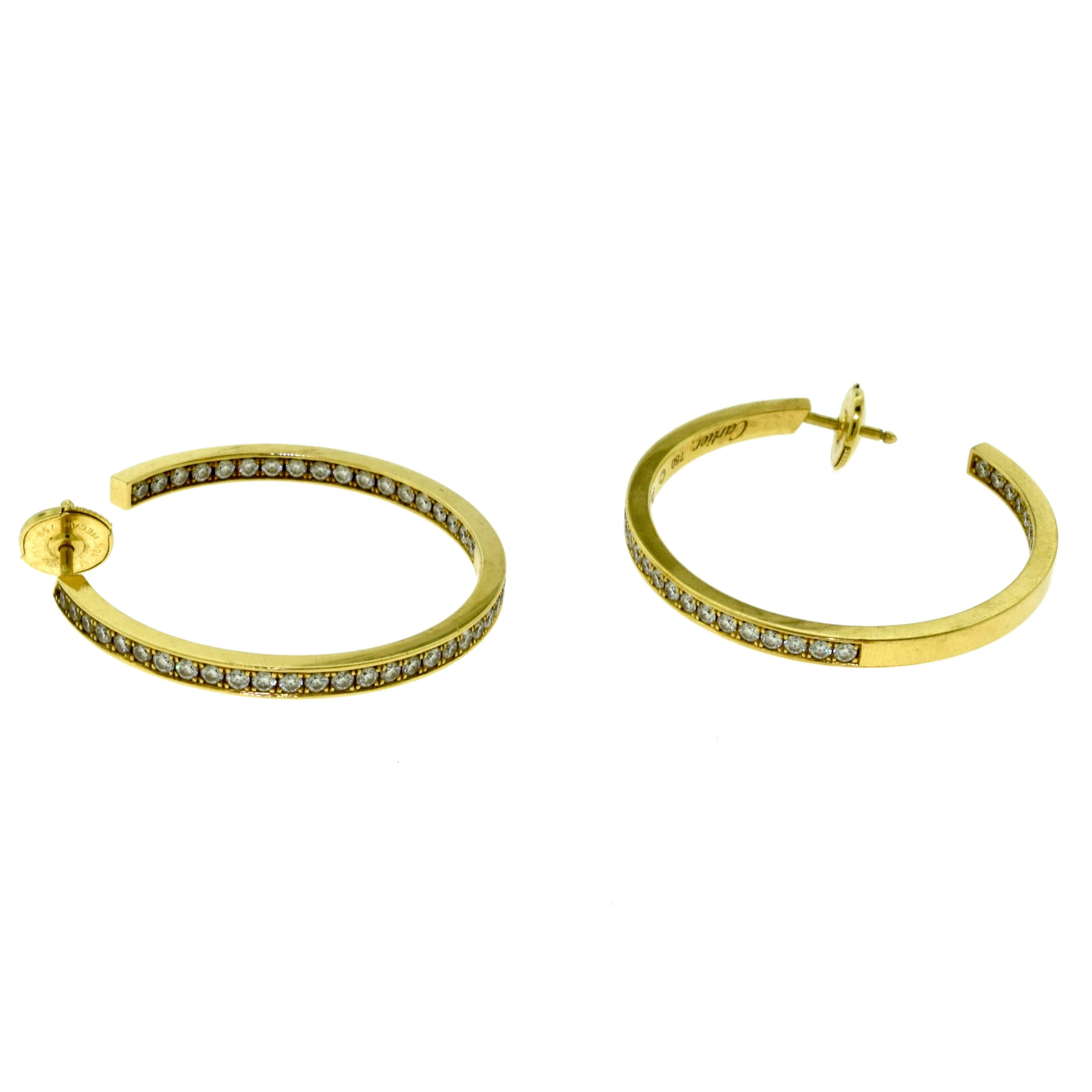 Women's or Men's Cartier Inside Out Diamond Hoop Earrings in 18 Karat Yellow Gold For Sale
