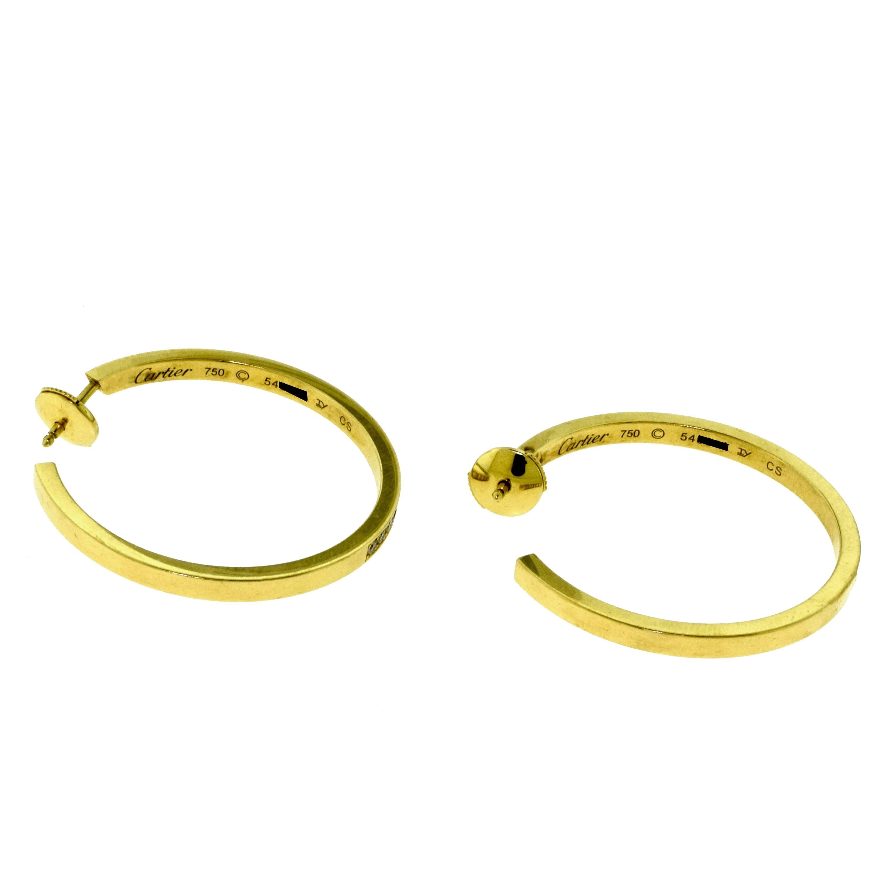 Cartier Inside Out Diamond Hoop Earrings in 18 Karat Yellow Gold In Excellent Condition For Sale In Miami, FL