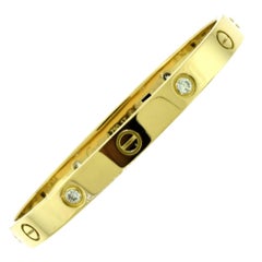 Cartier Love Bracelet in 18 Karat Yellow Gold, Four Diamonds