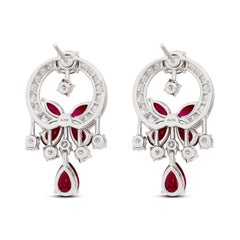Pendientes colgantes «Mini Butterfly» de Graff, en oro blanco de 18 quilates con rubíes y diamantes