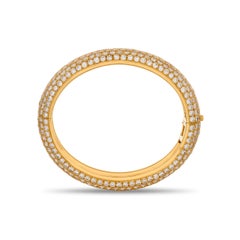 Pulsera brazalete Cartier de oro amarillo de 18 quilates con pavé de diamantes