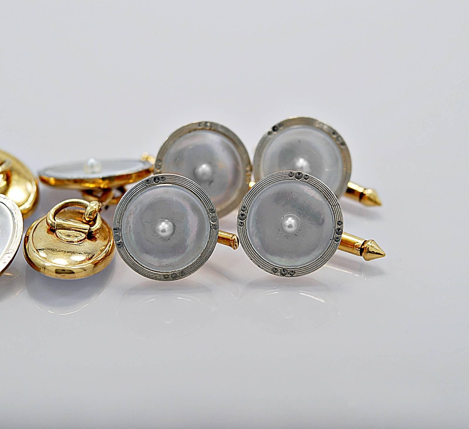 In the Tampa store this item has a retail price of $995.

A simple yet elegant Art Deco 14K White/Yellow Gold dress set made with Mother-Of-Pearl and center pearl decoration. Timeless!

Primary Stone(s): Mother-Of-Pearl 

Secondary Stone(s):