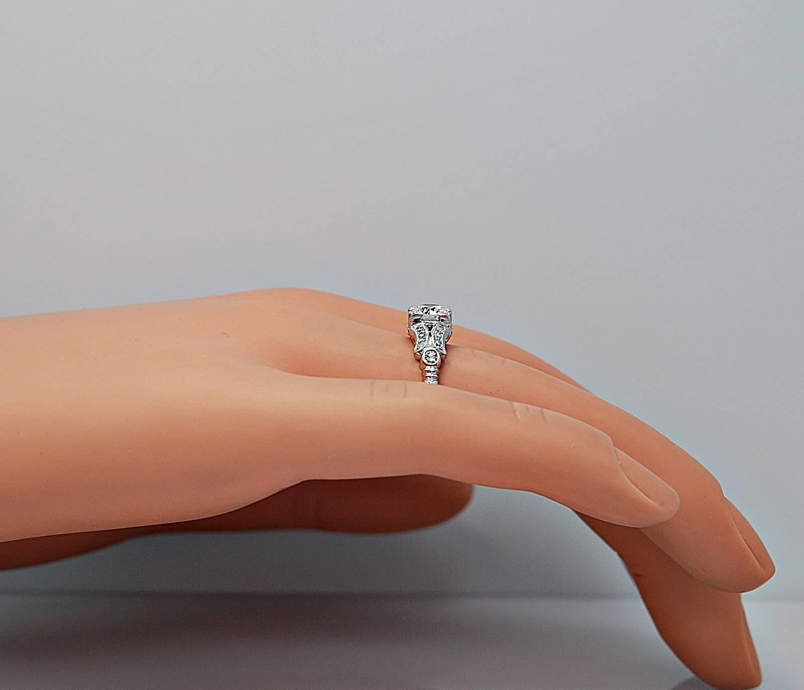 Women's Art Deco .55 Carat Diamond Platinum Engagement Ring For Sale