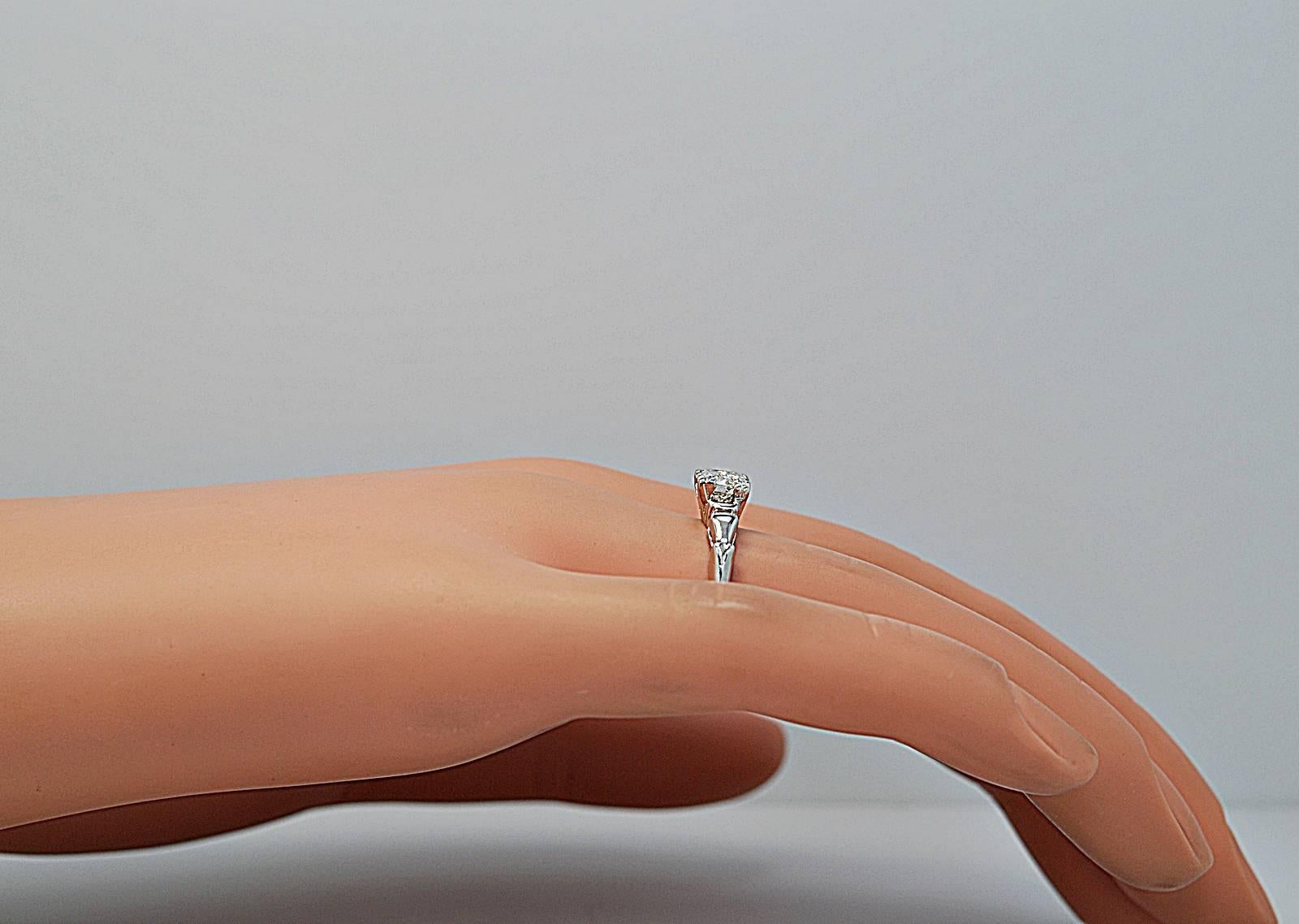 Women's Art Deco .58 Carat Diamond Platinum Engagement Ring For Sale