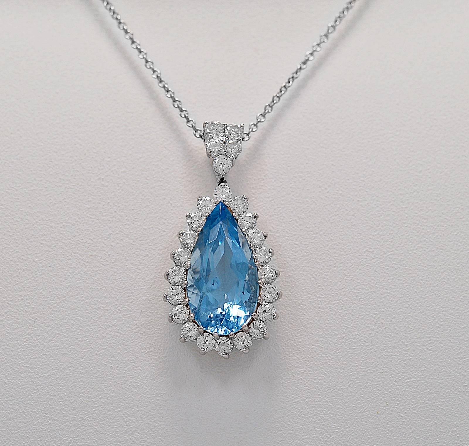 A stunning estate pendant featuring a 4.00ct. apx. pear shaped aquamarine with an accenting 1.00ct. apx. T.W. of round brilliant diamonds. The aquamarine is a deep rich sky blue surrounded by bright white diamonds. Exceptional quality and