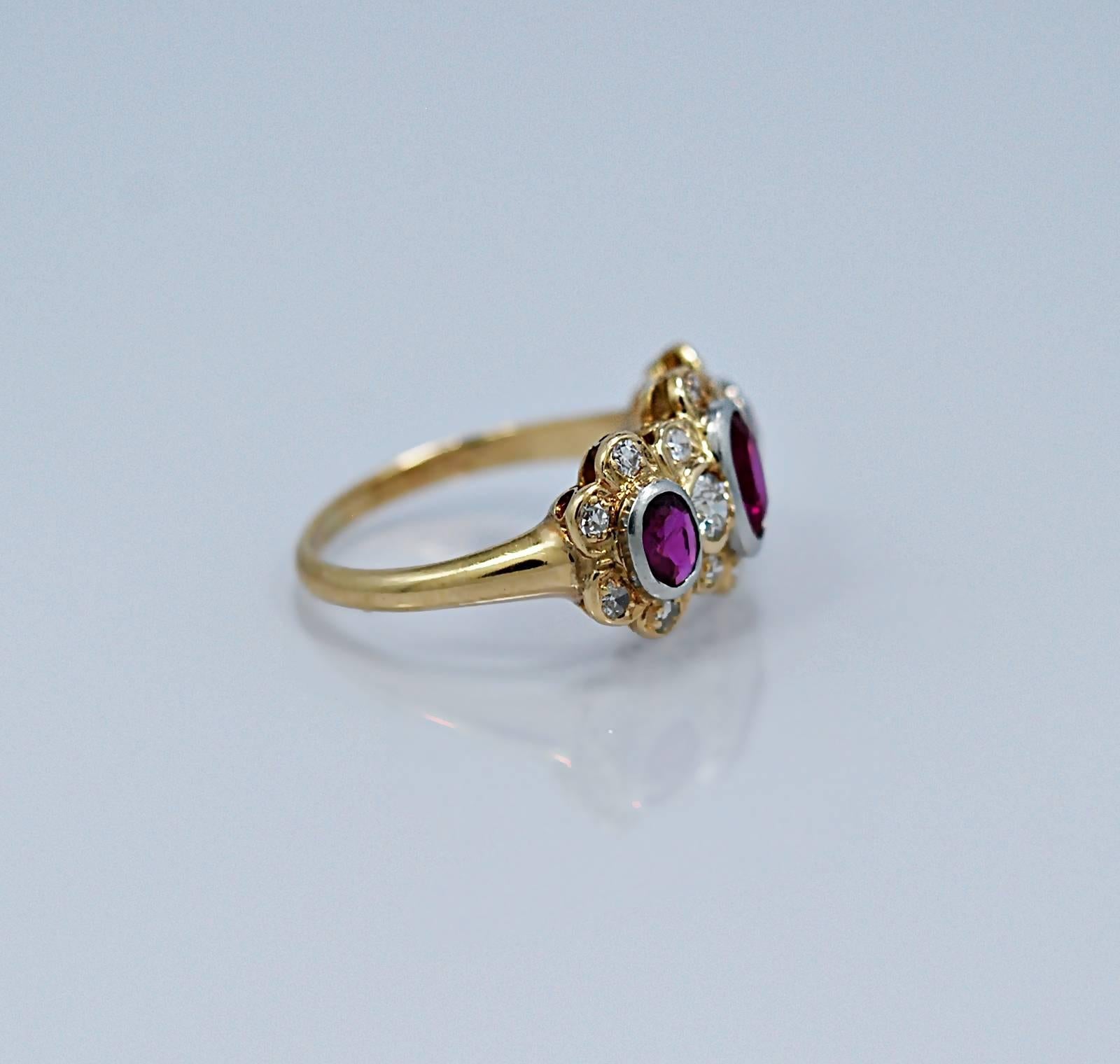 A striking 14k yellow gold ruby and diamond Edwardian engagement or fashion ring features 1.35ct. apx. T.W. of natural, unheated rubies of very high quality and .75ct. apx. T.W. of European and single cut diamonds with VS1-VS2 clarity and G-H color.