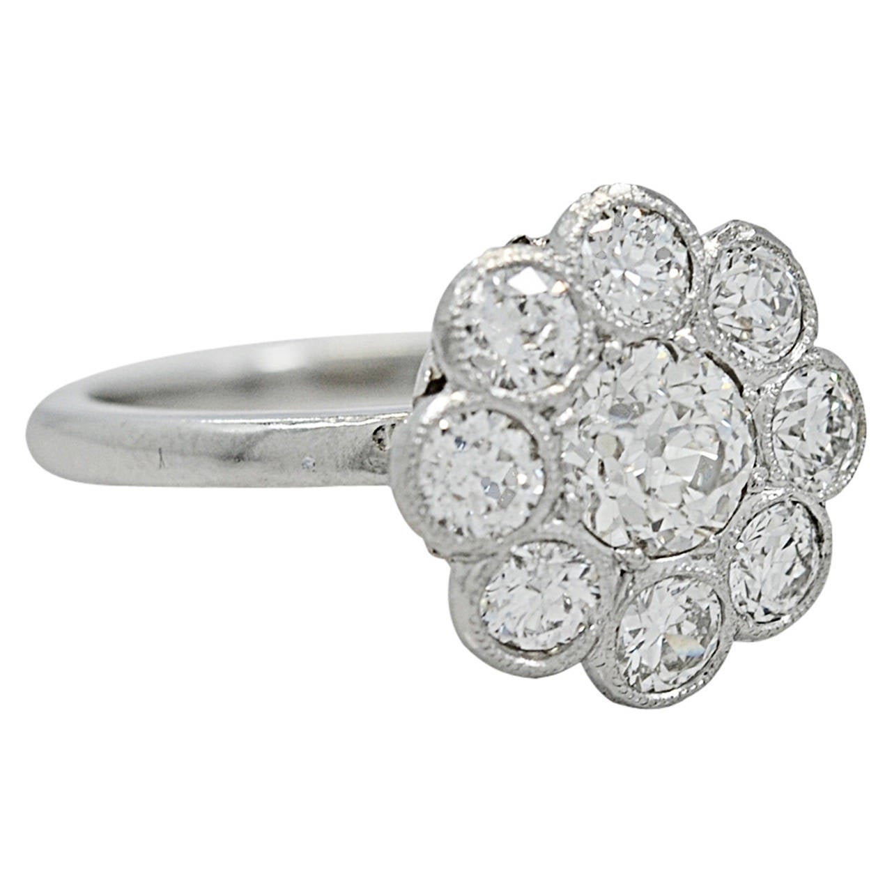 Extravagant Edwardian Diamond Platinum Cluster Engagement Ring