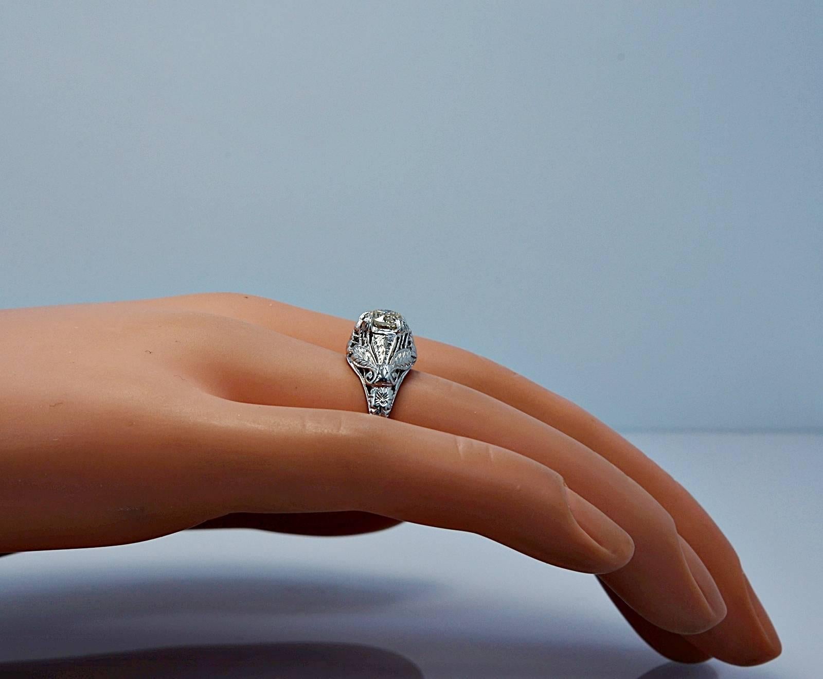 Stunning Art Deco .68 Carat Diamond Platinum Engagement Ring In Excellent Condition For Sale In Tampa, FL