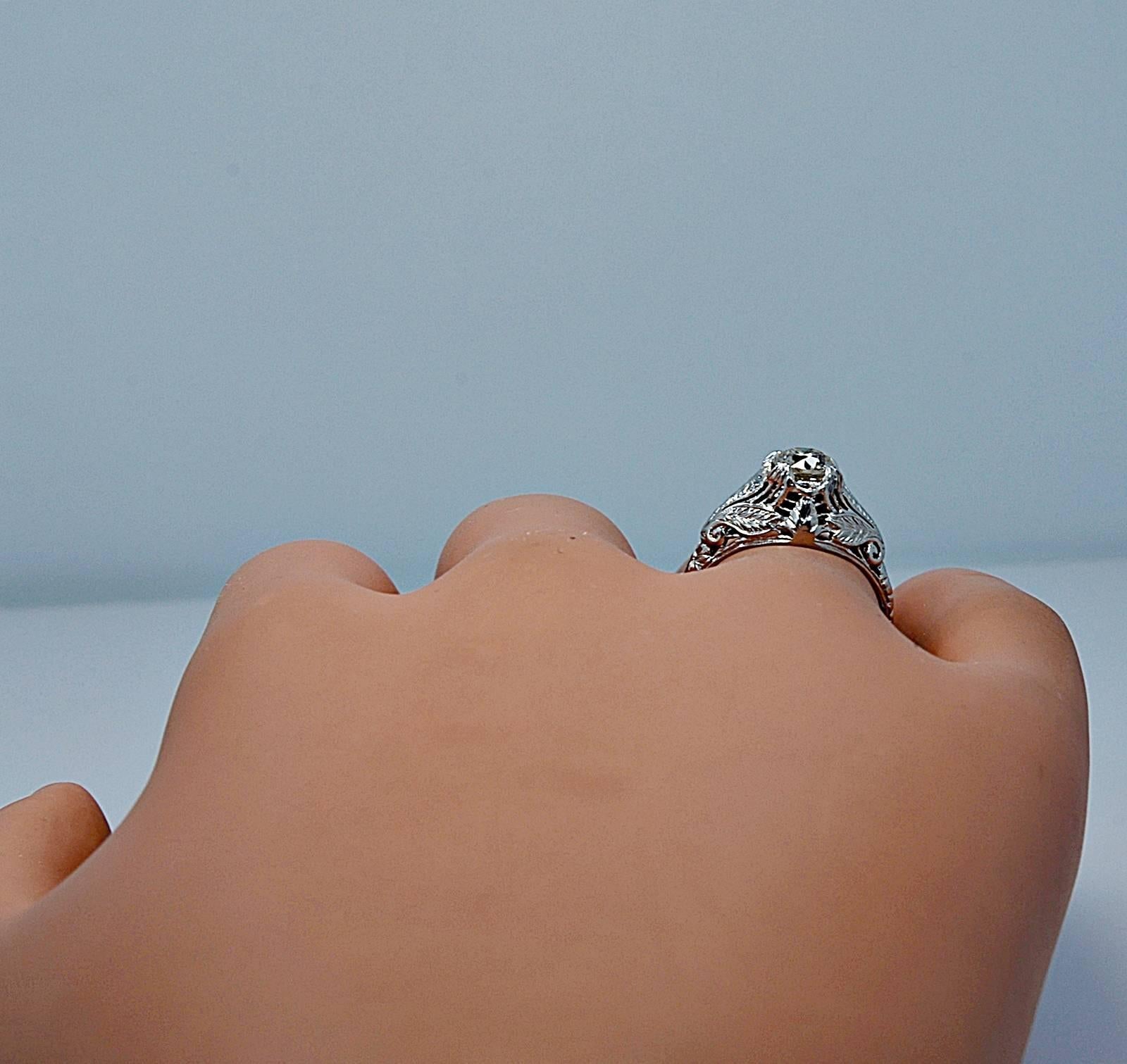 Women's Stunning Art Deco .68 Carat Diamond Platinum Engagement Ring For Sale