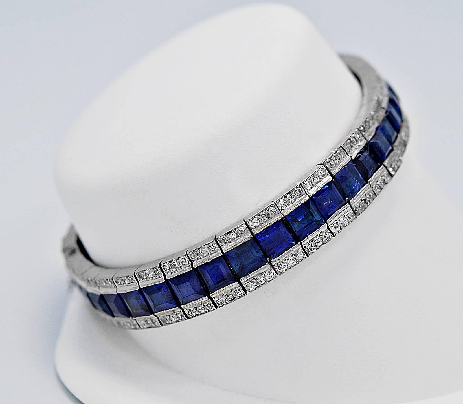A vintage bracelet featuring top quality unheated sapphires of exceptional color & clarity with a total weight of 13.00ct. apx. There is an additional 1.25ct. apx. of smaller diamonds which frame the sapphires, creating that classic 