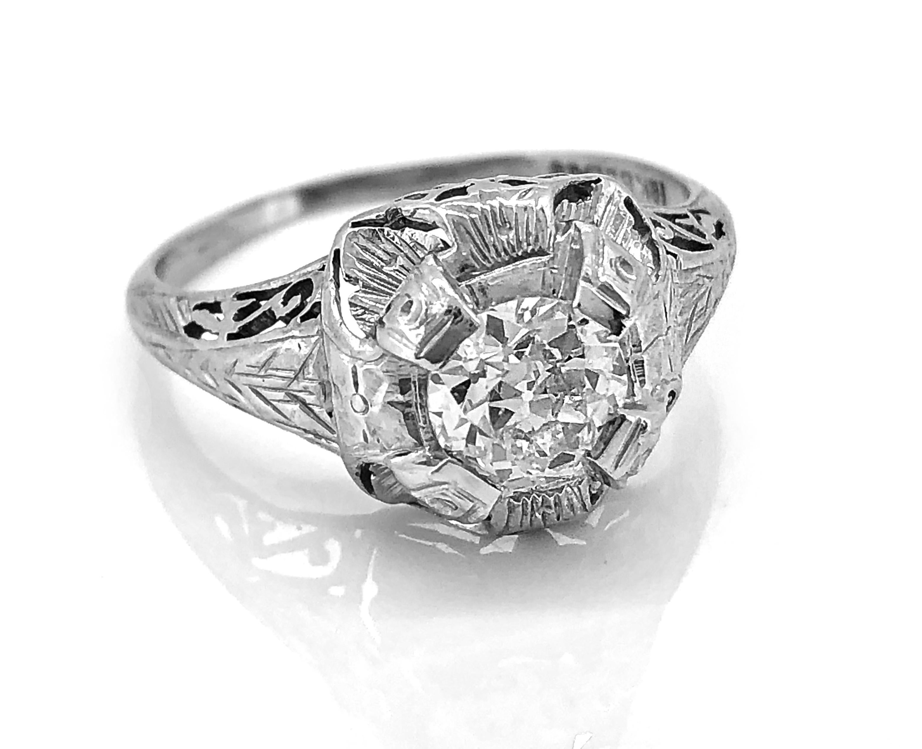 A distinctively crafted 18K white gold and diamond Antique engagement ring by 