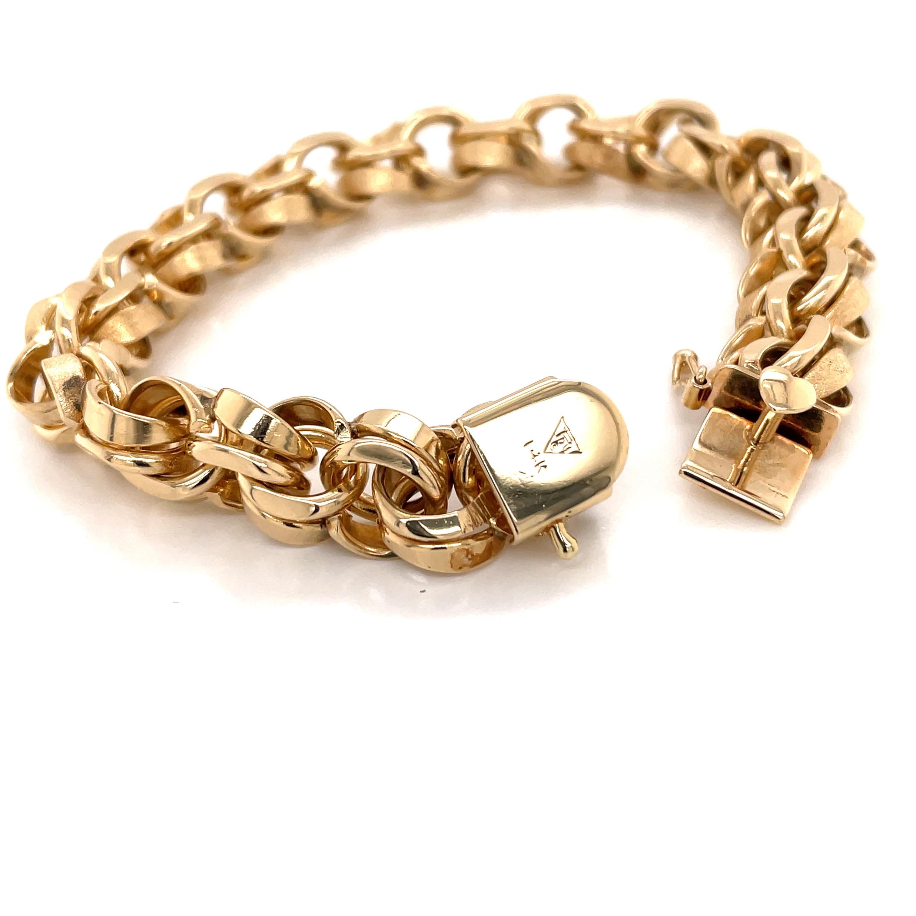 Vintage 1990s 14 Karat Yellow Gold Heavy Charm Bracelet In Good Condition For Sale In Boston, MA