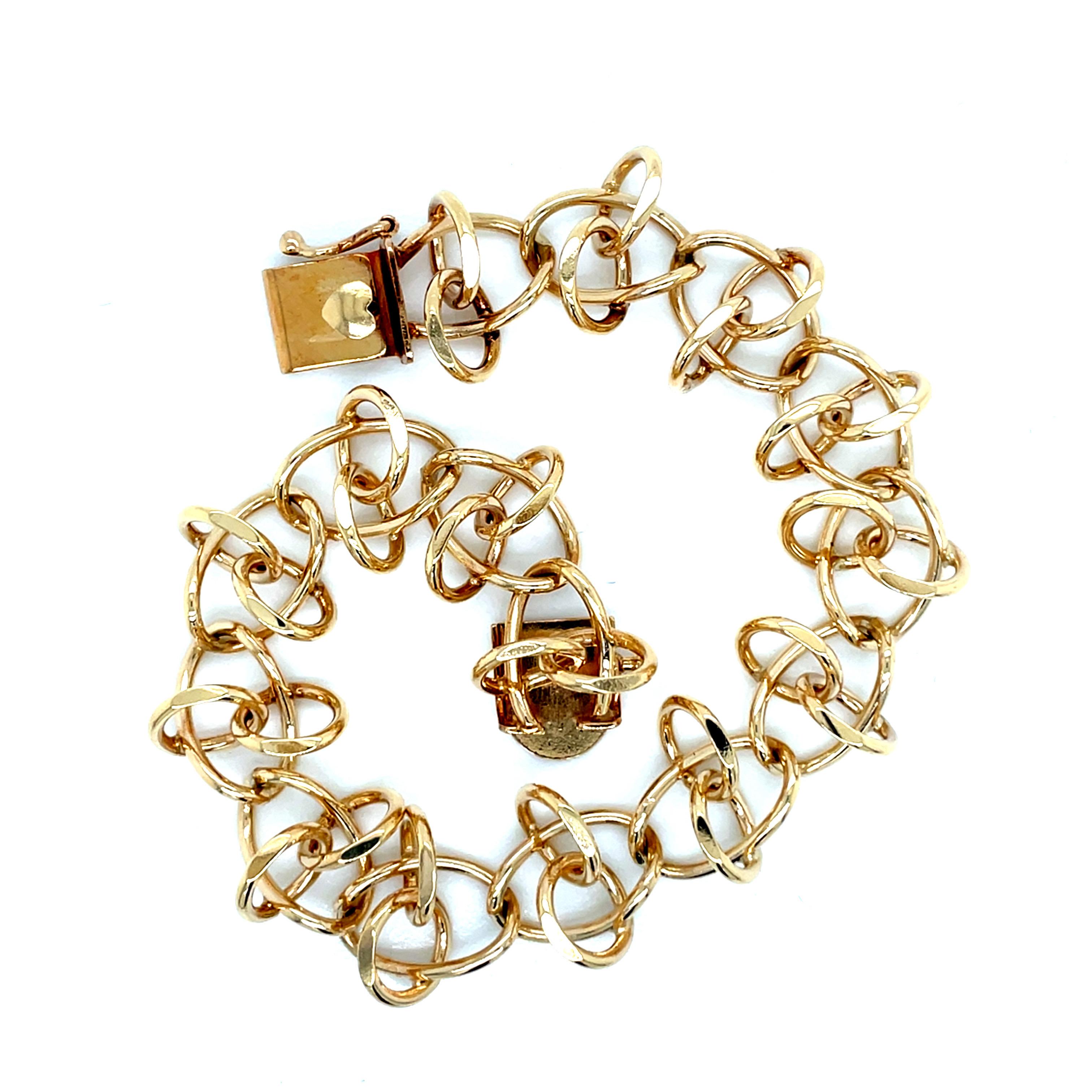 Vintage 1980er Jahre 14 Karat Gelbgold Charm-Gliederarmband im Angebot 3