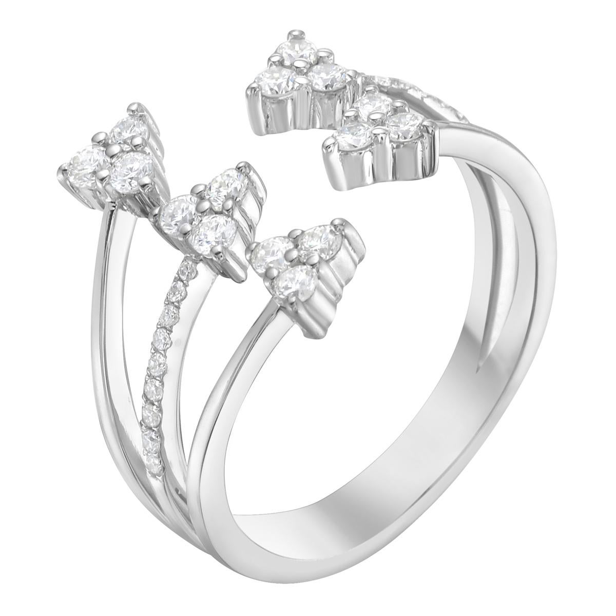Dieser Ring aus 14-karätigem Weißgold ist ein stilvolles und auffälliges Stück. Er hat ein modernes, offenes Wickeldesign, das wie Pfeile aussieht, die in verschiedene Richtungen zeigen. Jeder Pfeil besteht aus kleinen Büscheln runder Diamanten, die