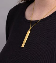 14 Karat Gold Needle Case Pendant Engraved 'Rock'