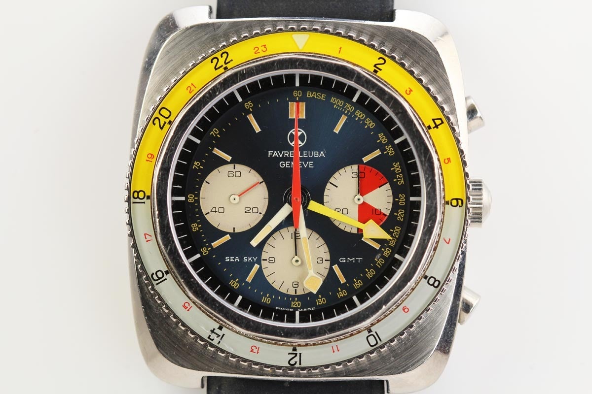 This is a very rare combination of the Favre-Leuba Sea/Sky GMT, Ref. 33053, with the yellow and white bezel with the blue dial. The watch is in mint condition. 

This stainless steel watch has a cushion case, ivory-color and red registers, mineral