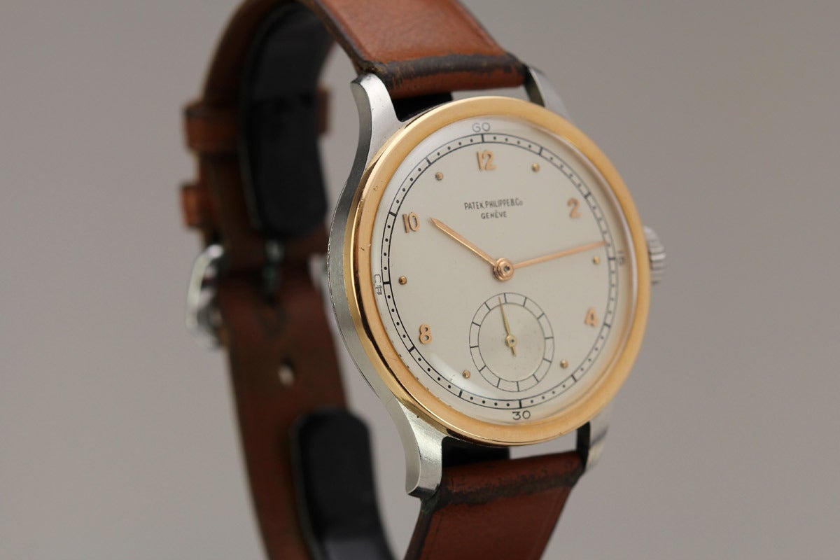 This is the most incredible Patek Philippe Calatrava reference 570 I have ever seen.   The unpolished case has an extremely  rare combination of stainless and gold.  I have seen this combination of steel and gold bring over 500k at auction.   The