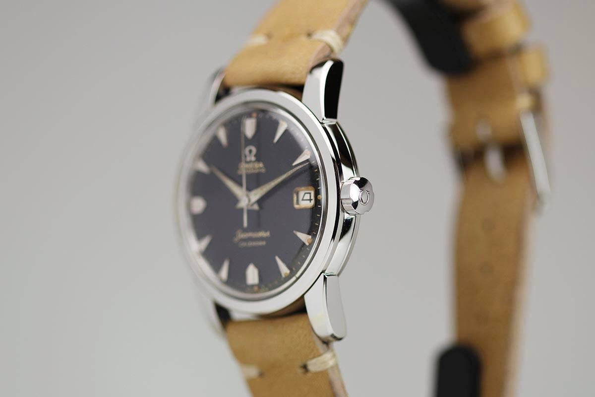 This is a Omega Seamaster Calendar reference 2849 8 SC with an original black dial and run with a caliber 530 automatic movement.