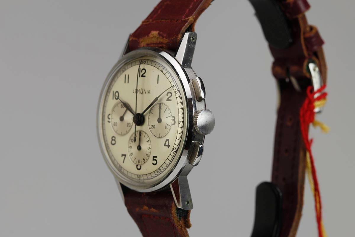 Beautiful Lemania chronograph in excellent condition with hang tag.
