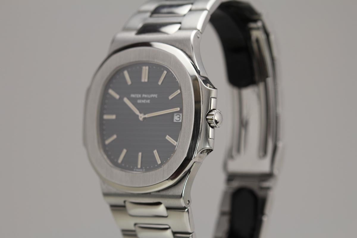 This is a great example of an original Jumbo Patek Philippe Nautilis reference 3700 from 1982. The reference 3700 is an iconic model that was designed by Gerald Genta. This particular watch is in mint condition with a tight bracelet and sharp bezel.