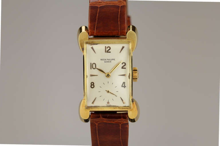 Patek Philippe 18k rose gold rectangular wristwatch with unusual lugs, Ref. 2503, circa 1955, dial has applied Arabic and dagger indexes, subsidiary seconds, manual-wind movement.