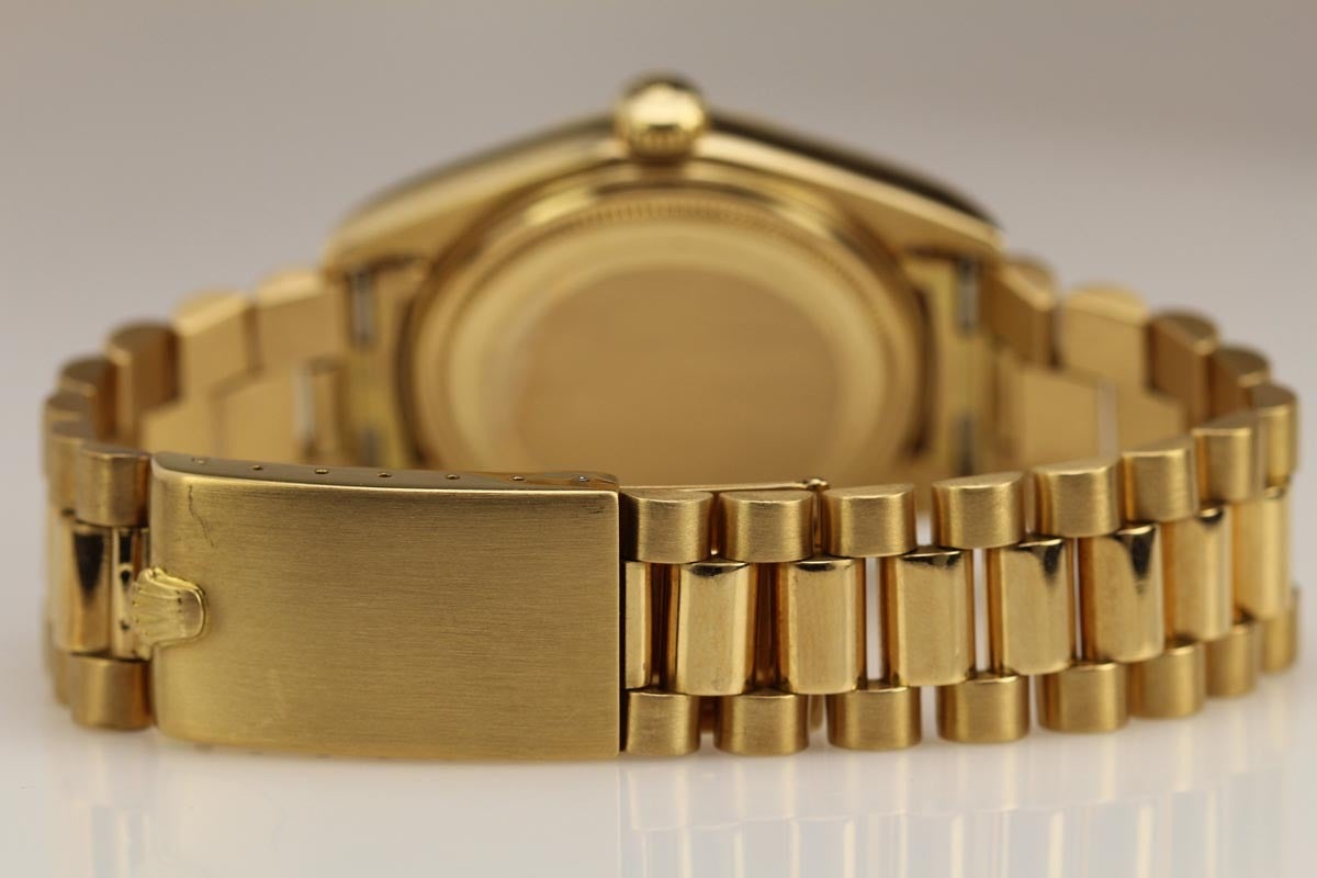 rolex day date gold turquoise