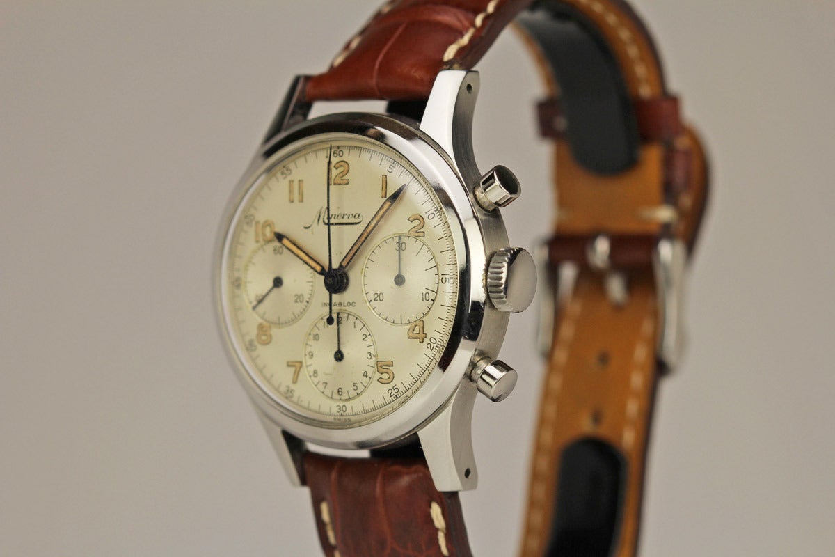 Minerva chronograph with an original silvered dial, Arabic luminous numerals, and a caliber 72 manual wind movement.
