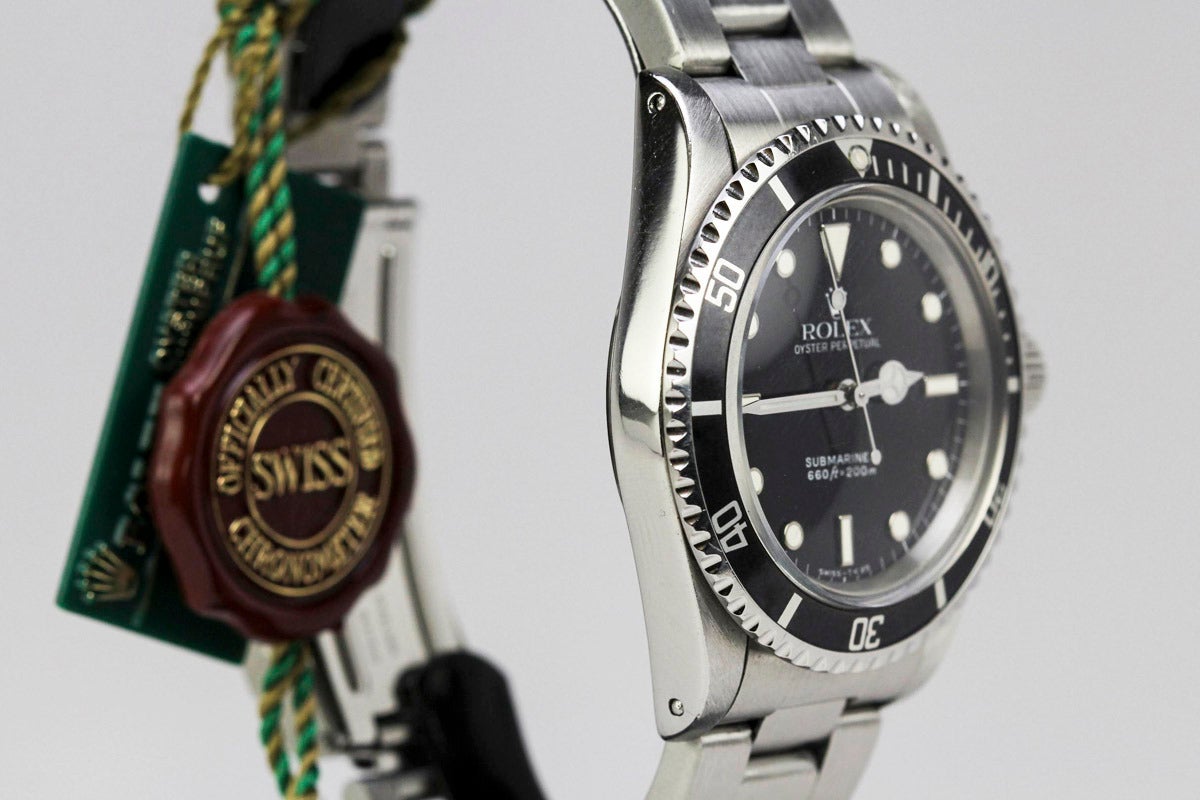 This Rolex Submariner 5513 marks the end of an era. This watch is an L Series 5513 Submariner, which is one of the last years 5513's were produced. This watch was manufactured in 1989 and then sold in 1990. The watch has a beautiful original glossy