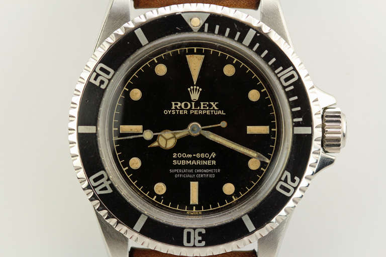 This is an exceptional example of a stainless steel Rolex Submariner, Ref. 5512, circa 1962. The original gilt dial with outer chapter ring is flawless. It is one of the best gilt dials I have seen on one of these models. Typically the gilt dials on